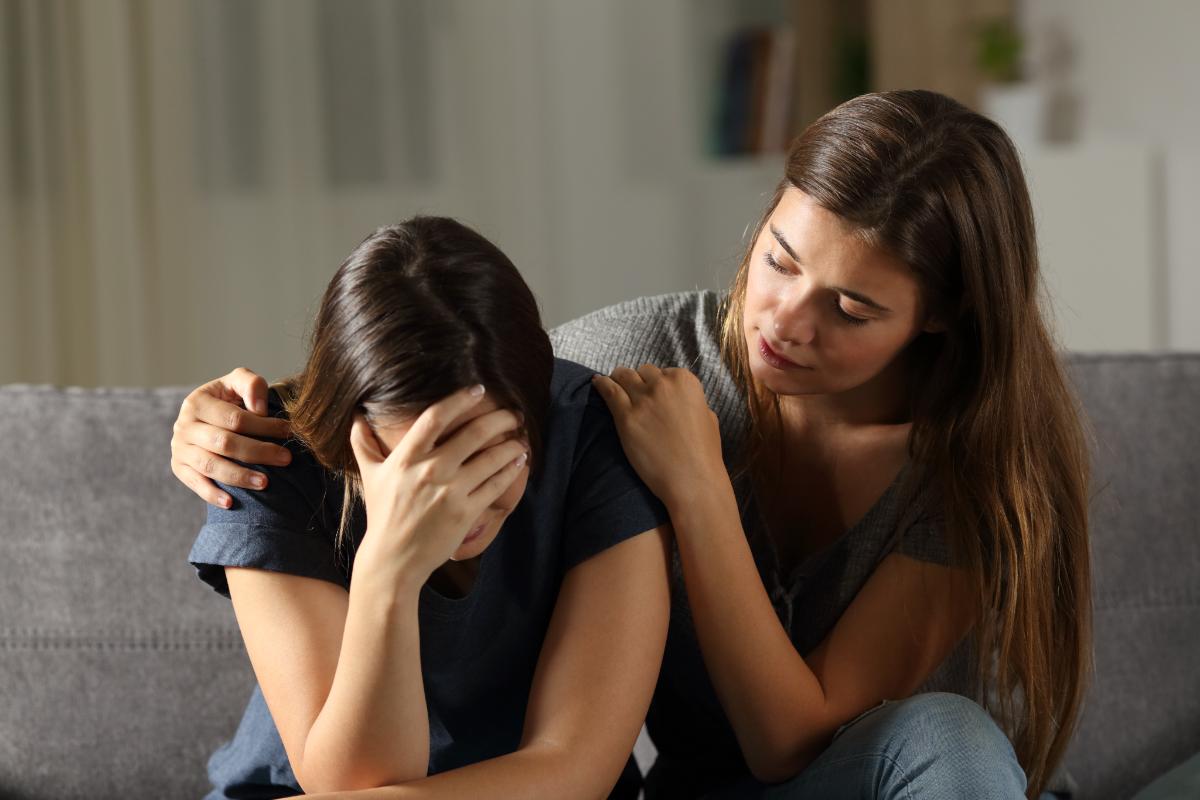 person comforting another with depression rehab los angeles